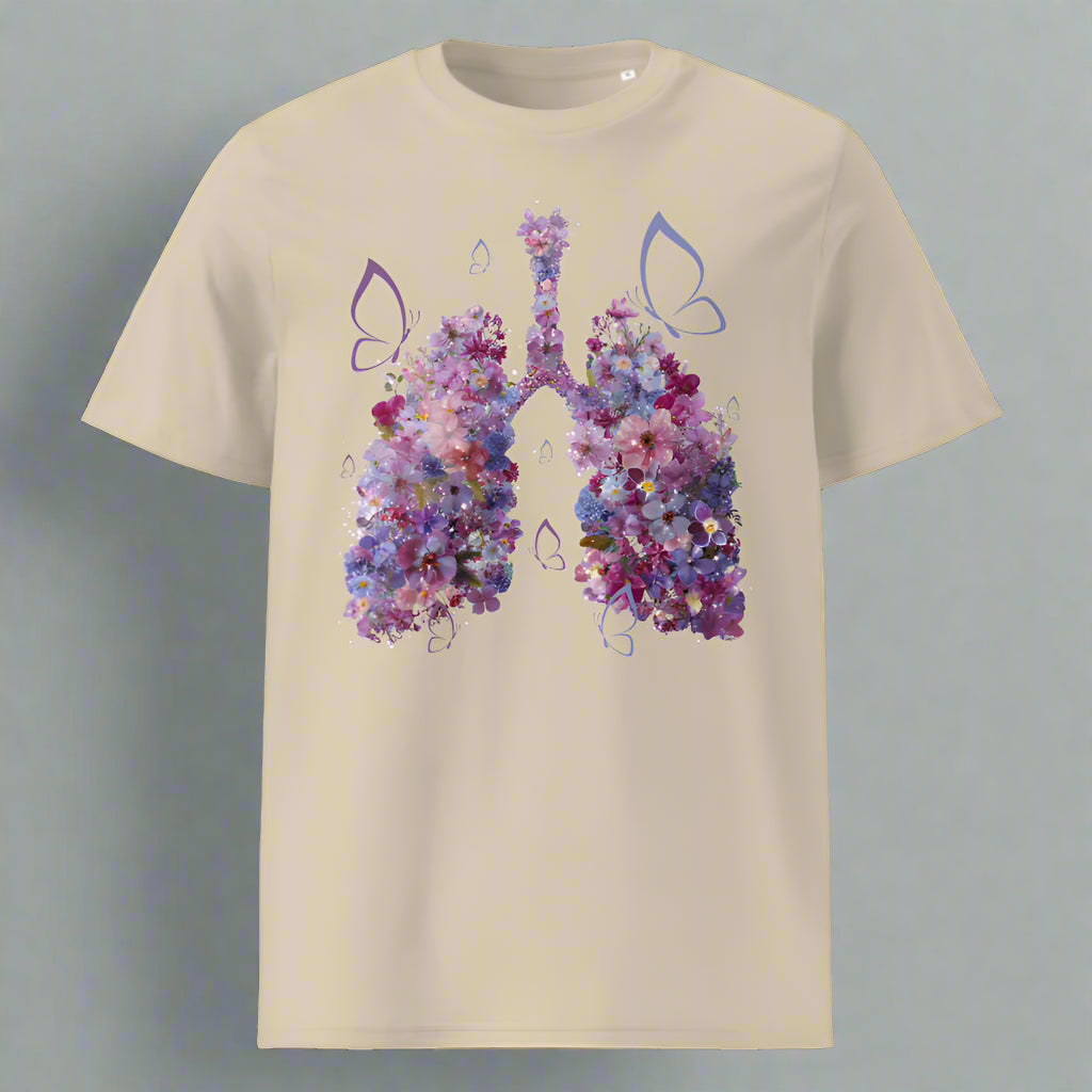 Beige t-shirt with a colorful floral design of lungs on a white background